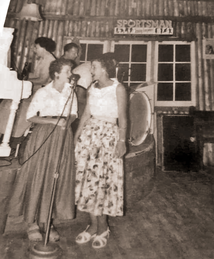 Inside the Dance Hall with Jeanne Smith at the piano. Others unknown.